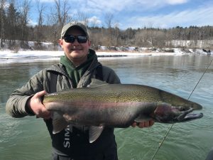 Robert Kerr - Fly Fishing Guide fisherman holding caught steelhead